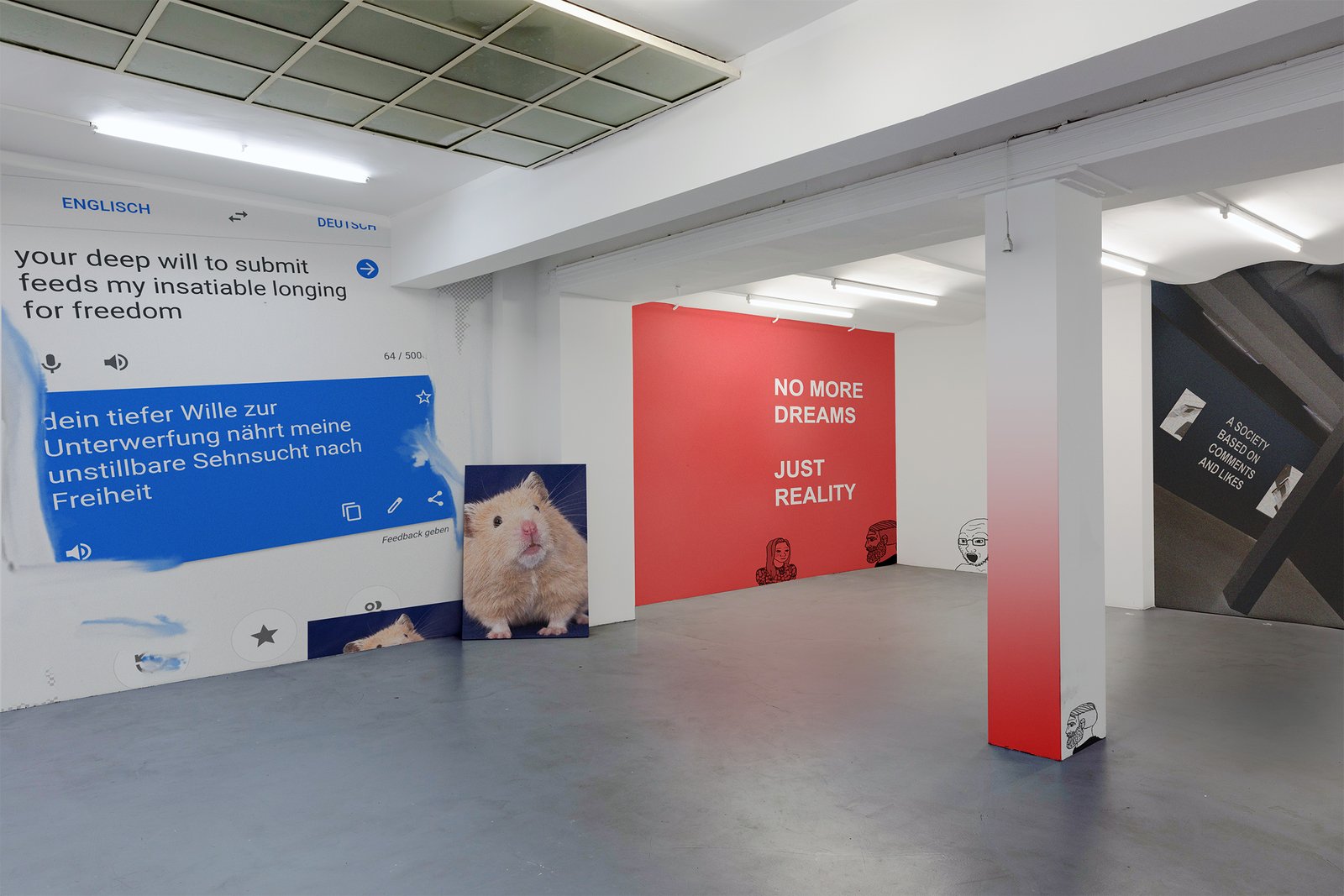 Installation view with the blue wallpaper work your deep will to submit and NO MORE DREAMS