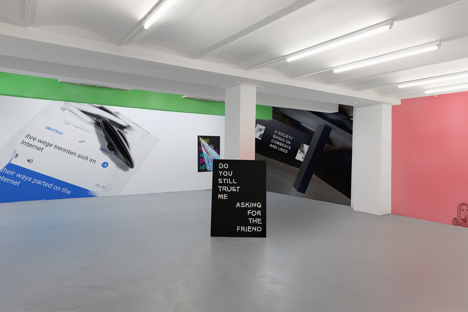 Installation view with green and pink walls and DO YOU STILL TRUST ME